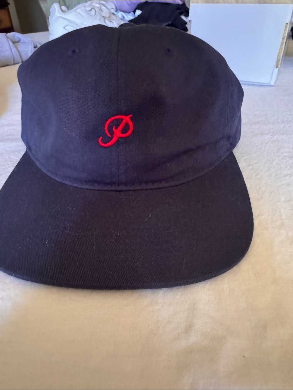 Primitive Black Hat with Red 'P' Embroidery
